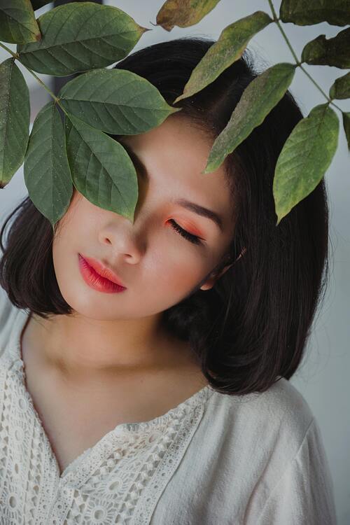 A serene image of someone sleeping peacefully, representing the importance of sleep for skin repair.