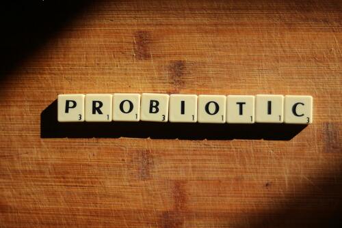 A person looking happy and energized, symbolizing the positive effects of good gut health.